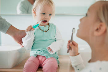 Should Toddlers Read Before or After Brushing Their Teeth_350